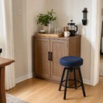 Compact small home bar with a narrow cabinet, measured stool clearance, wall bottle opener, layered storage, and a clear walking path