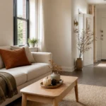 Small apartment living room with restrained rust and olive fall decor
